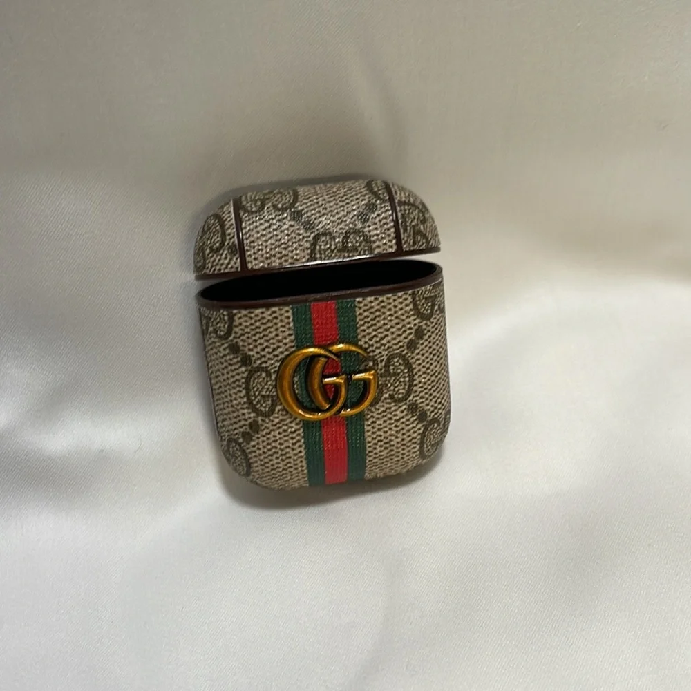 Gucci (fake) iphone 12promax phone case and matching airpod case